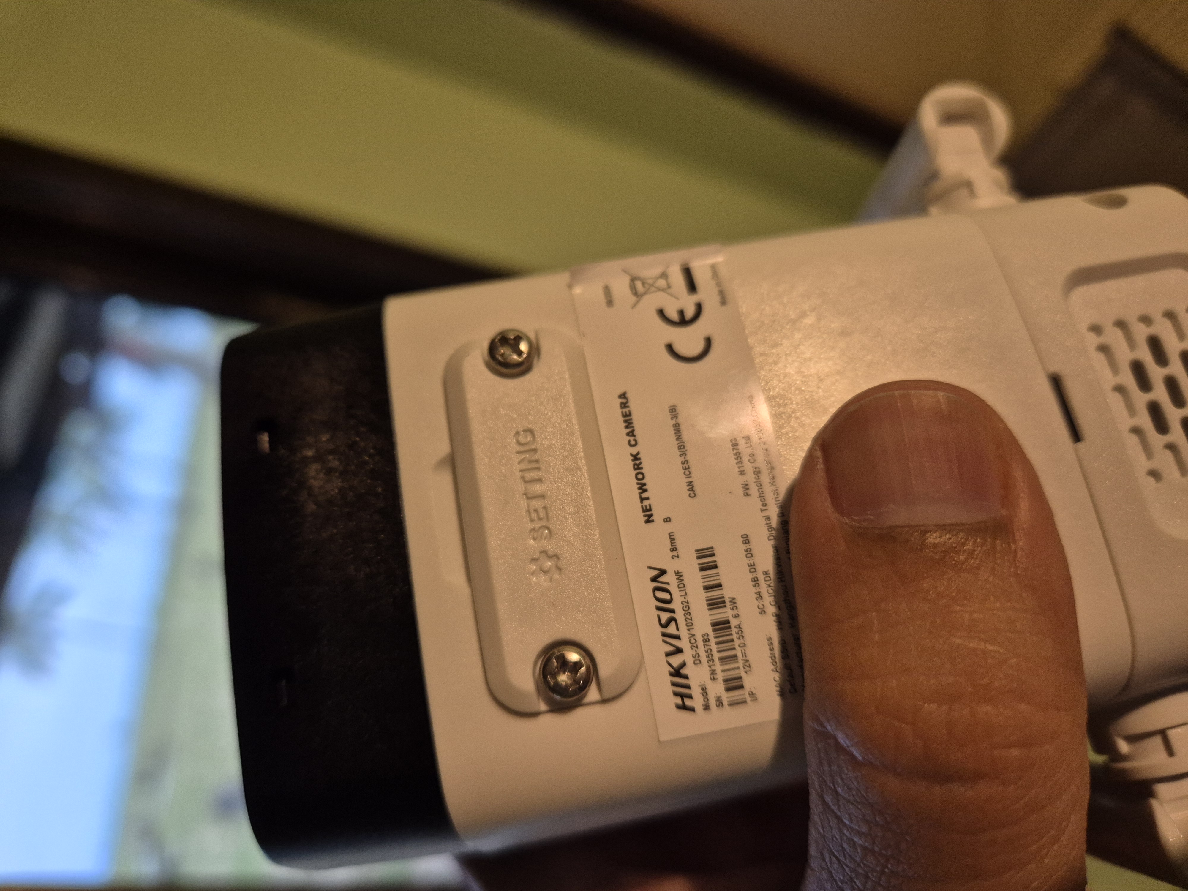 (hikvision_wifi_camera_reset_button_under_this_panel